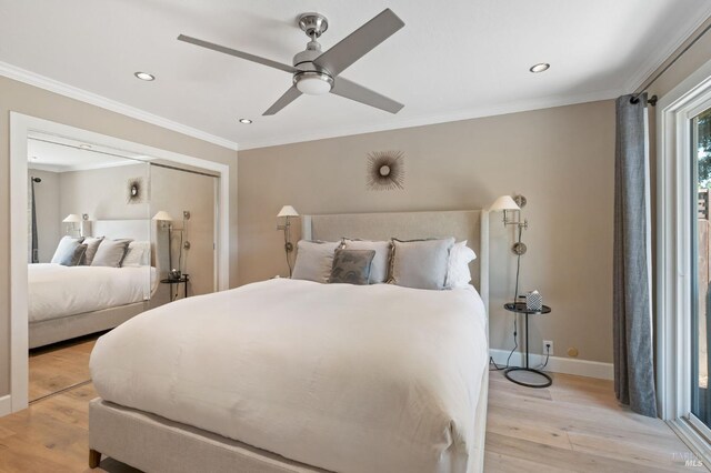 bedroom with light wood-type flooring, ceiling fan, and crown molding