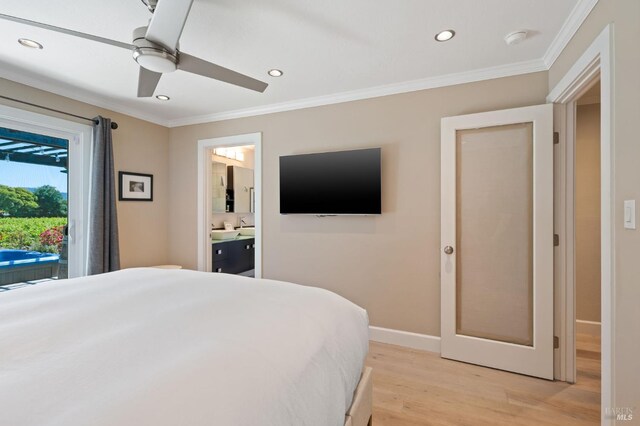 bedroom featuring access to exterior, crown molding, light wood-type flooring, ensuite bathroom, and recessed lighting
