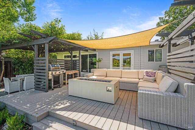 wooden terrace featuring a pergola, a grill, and an outdoor living space with a fire pit