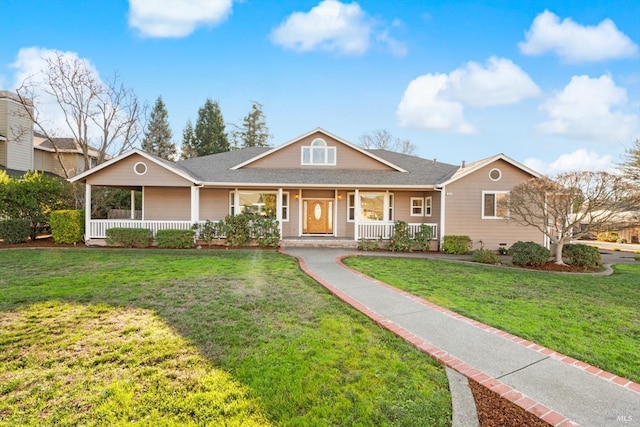 view of front of property featuring a porch and a front lawn