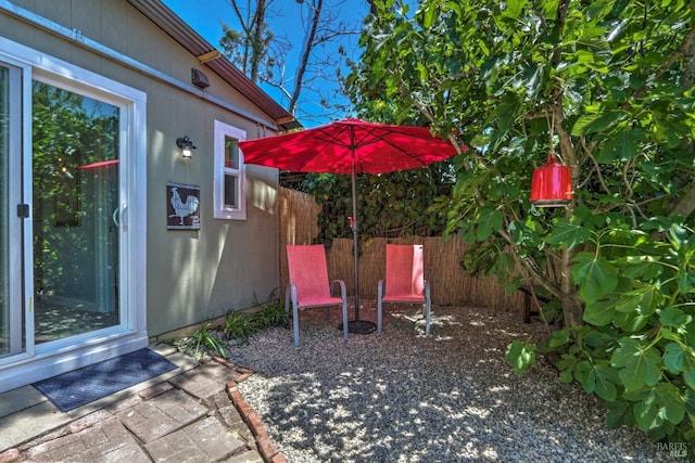 view of yard with a patio and fence
