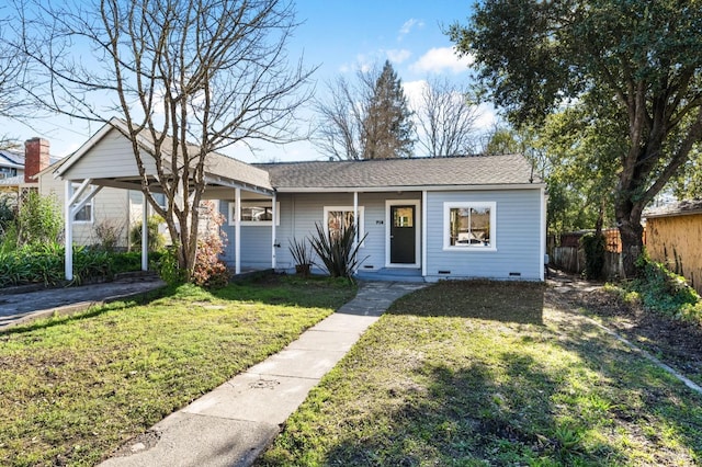 ranch-style house featuring a front yard