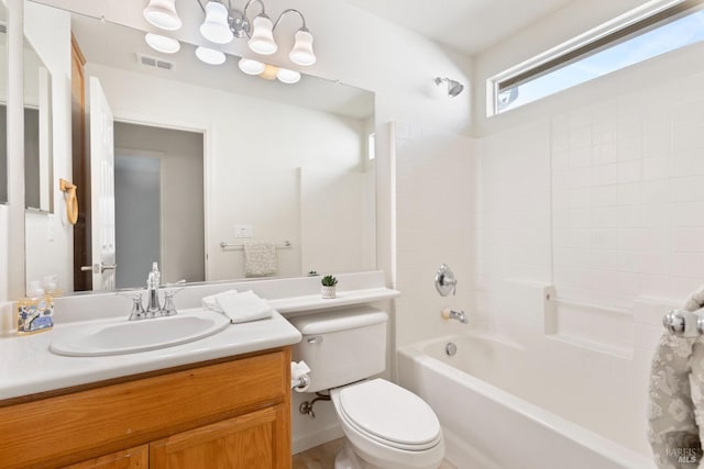 full bathroom featuring toilet, tub / shower combination, and vanity