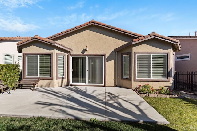 rear view of property with a patio