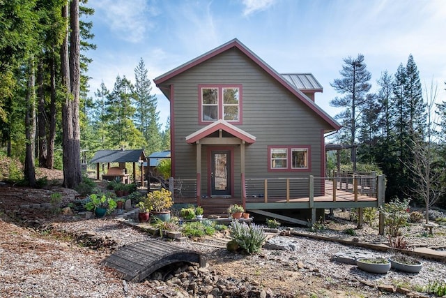 view of front of home featuring a wooden deck