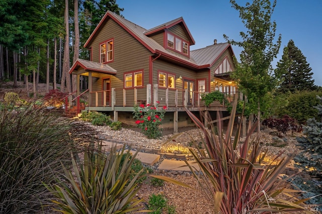 40695 Roseman Creek Rd, Gualala, CA 95445 - view of front of house featuring metal roof and a wooden deck