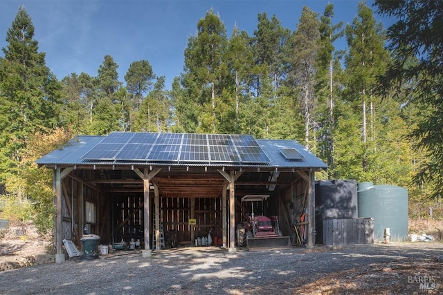 view of property's community with an outbuilding