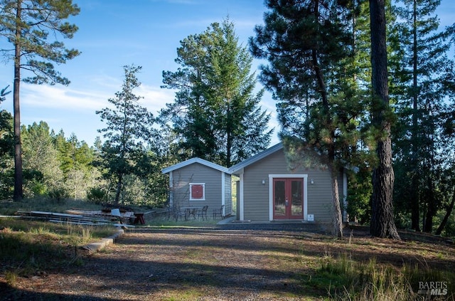 40695 Roseman Creek Rd, Gualala, CA 95445 - view of front facade with french doors