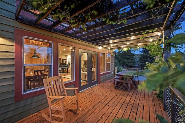 40695 Roseman Creek Rd, Gualala, CA 95445 - wooden deck featuring outdoor dining space, a pergola, and french doors
