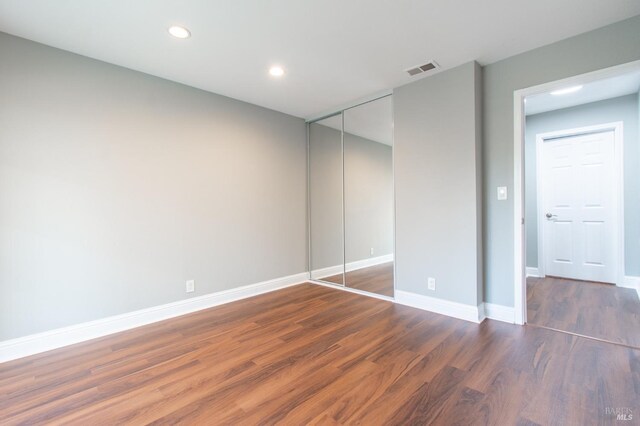 interior space with dark wood-type flooring