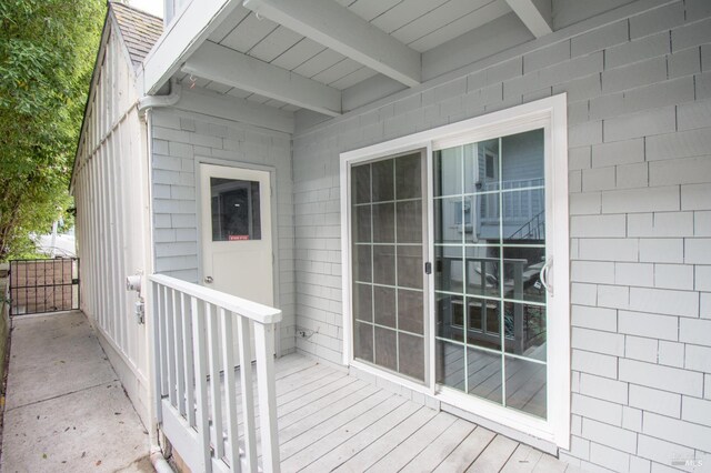 entrance to property featuring a deck