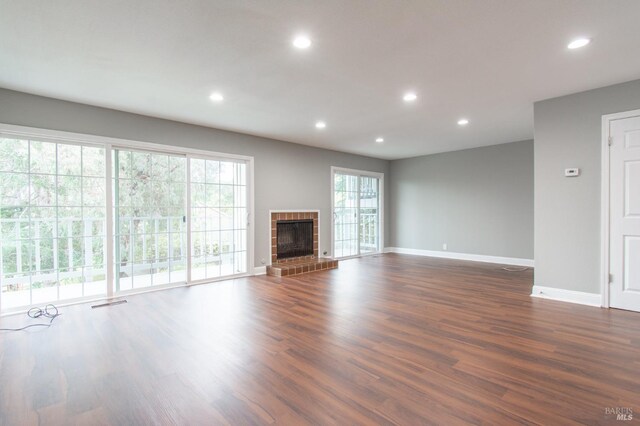 unfurnished living room with light hardwood / wood-style flooring