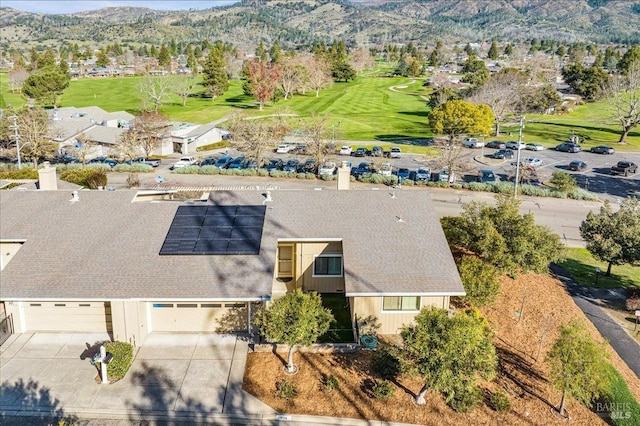 drone / aerial view featuring a mountain view