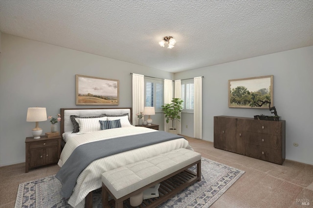 bedroom with light carpet and a textured ceiling