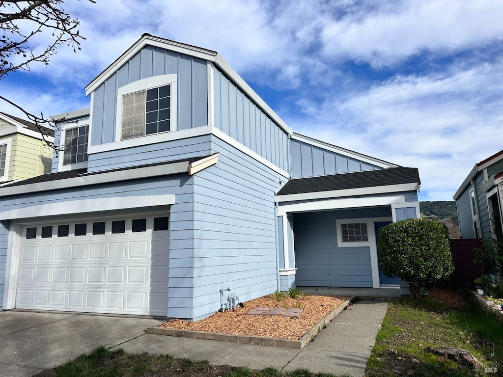 view of front of property with a garage