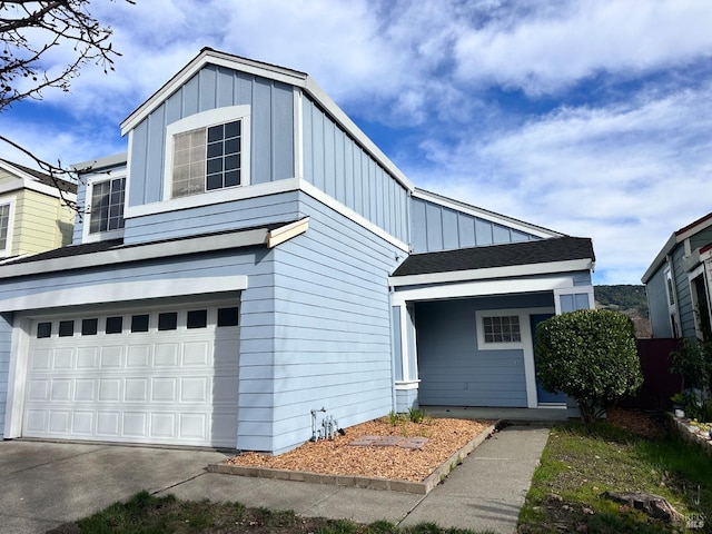 view of front of property with a garage