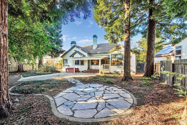 rear view of house with a patio