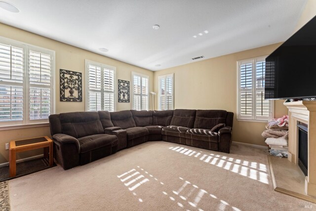 living room featuring light colored carpet