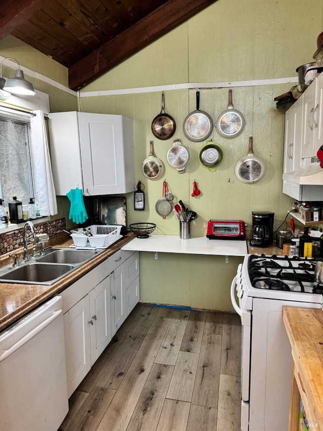 kitchen with extractor fan, wooden counters, light wood-type flooring, white appliances, and white cabinets