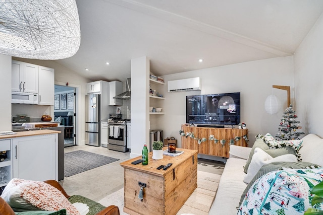 living room featuring recessed lighting, vaulted ceiling, and a wall mounted AC