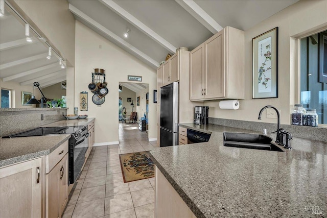 kitchen with vaulted ceiling with beams, sink, black range with electric cooktop, light brown cabinets, and stainless steel fridge