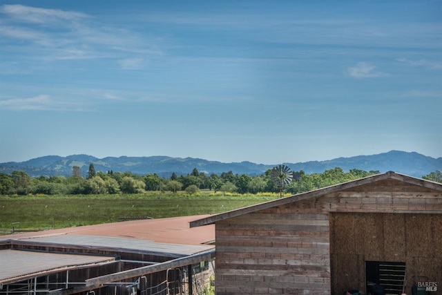 view of mountain feature with a rural view