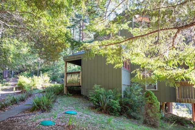 view of yard with a wooden deck