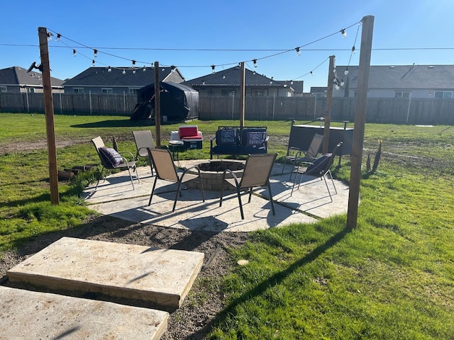 view of patio with a fire pit