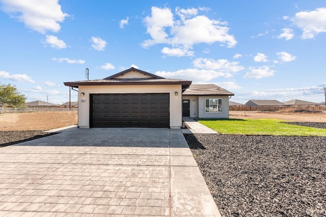 ranch-style home with a garage