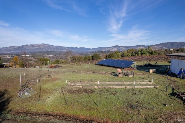 view of mountain feature with a rural view