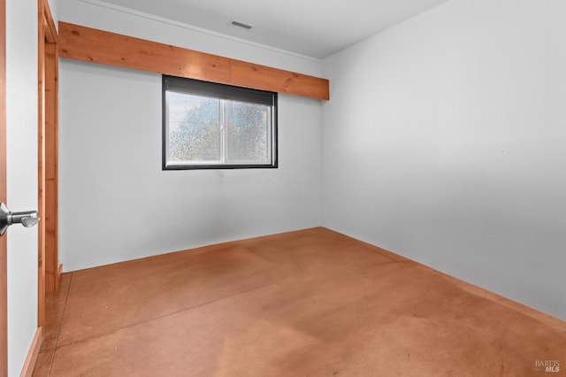 unfurnished room with light carpet