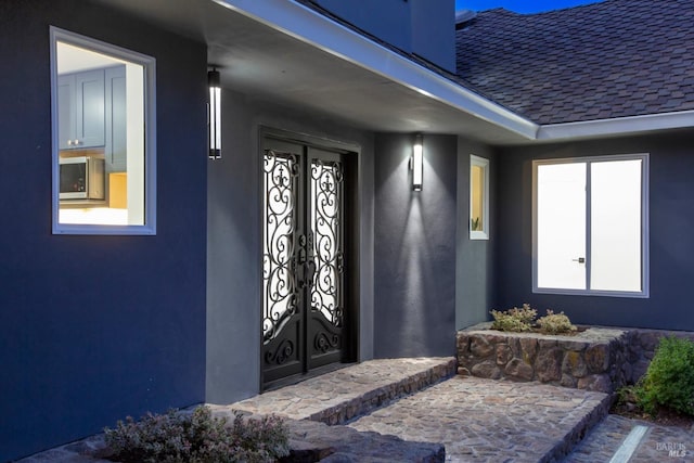 doorway to property with french doors