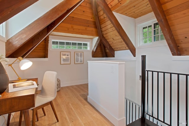 office space featuring wood ceiling, light hardwood / wood-style floors, and vaulted ceiling with beams