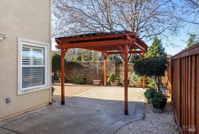 view of patio featuring a pergola