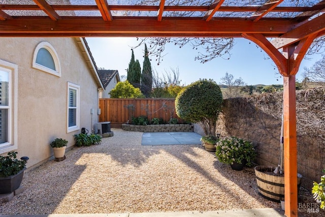 view of yard with a patio area and a pergola