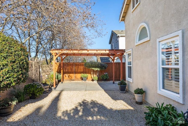 view of patio / terrace featuring a pergola