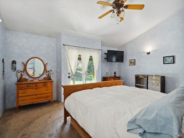 bedroom featuring carpet floors, vaulted ceiling, and a ceiling fan