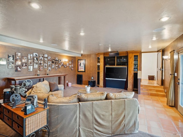 living area with light tile patterned flooring and recessed lighting