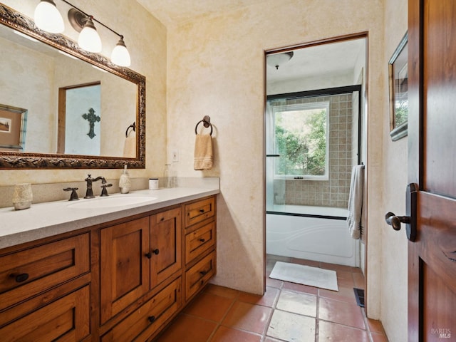 full bathroom with vanity and tile patterned floors