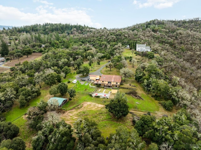 bird's eye view featuring a view of trees