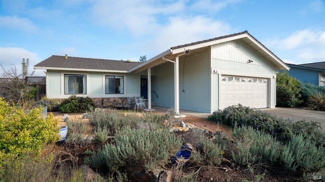 ranch-style home with a garage