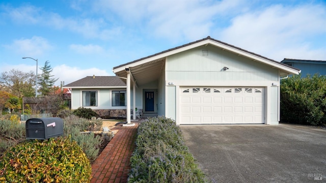 ranch-style home with a garage