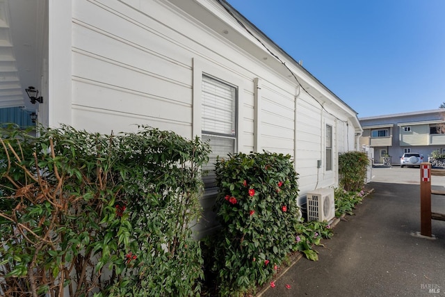 view of property exterior featuring ac unit