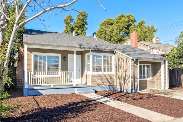 ranch-style home with covered porch