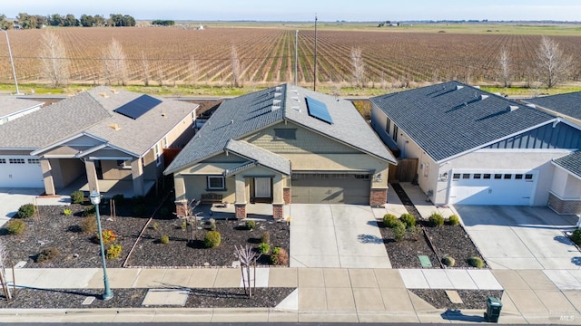 birds eye view of property featuring a rural view