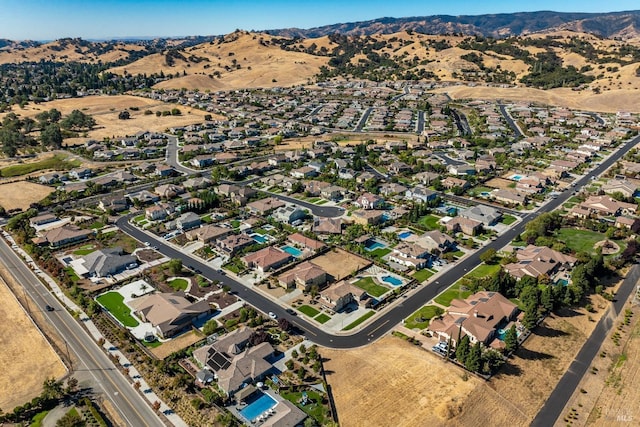 drone / aerial view featuring a mountain view