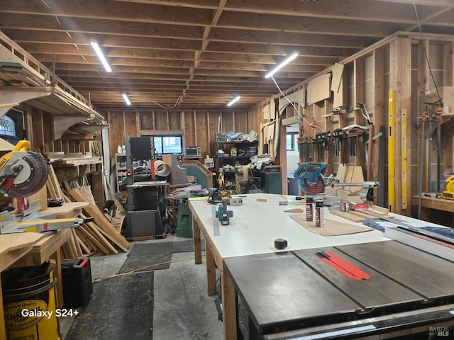 basement with a workshop area