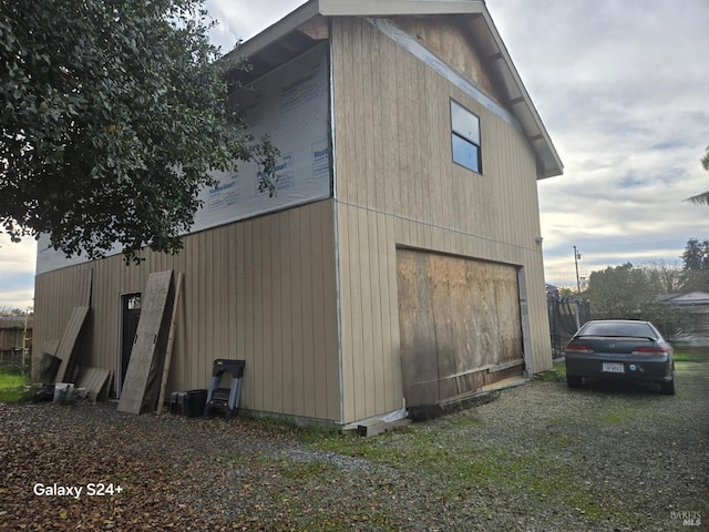 view of property exterior featuring a garage