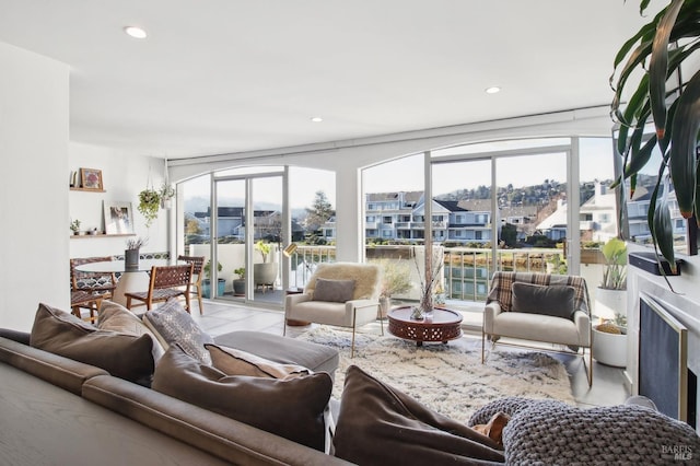 living room with a premium fireplace