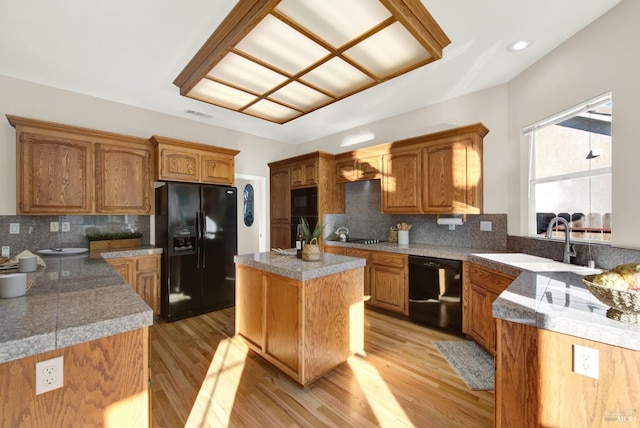 dining area with light hardwood / wood-style floors and a wealth of natural light